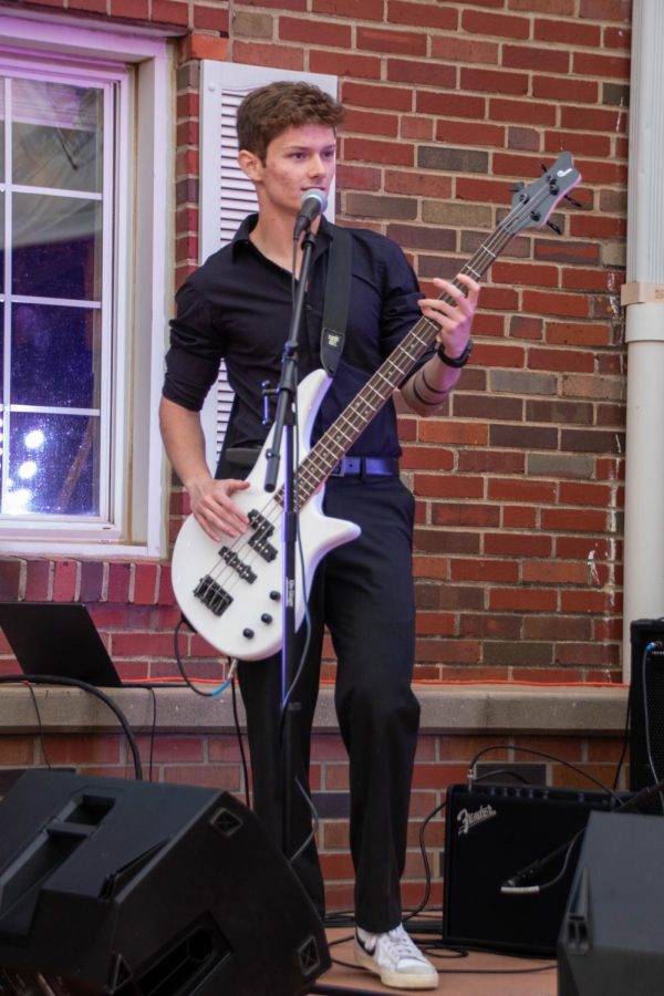 Sigma Alpha Epsilon freshman Zach Gordon performs at Paddypalooza on April 24. He said, even though the band messed up, they had a lot of fun.