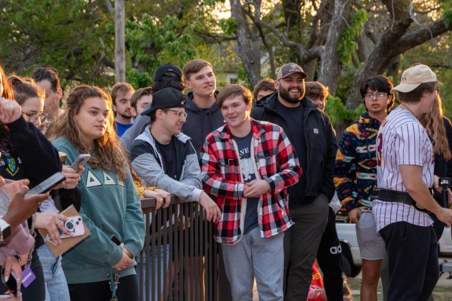 Sigma Alpha Epsilon students wait outside before Paddypalooza starts. After a week of SAE working to raise money, all donations were made to Childrens Miracle Network.