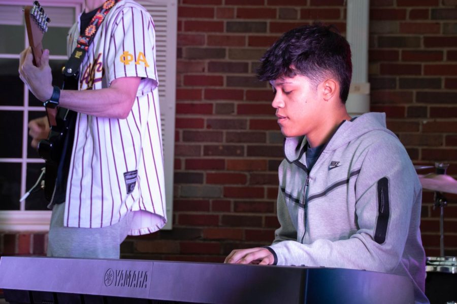Sigma Alpha Epsilon member Nano Hernandez plays piano during his final performance at Paddypalooza on April 24. He played guitar as well.
