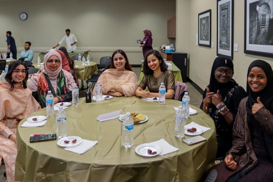Members of the Muslim Students Association pose for a photo at the Ramadan Iftaar Banquet on April 17.
