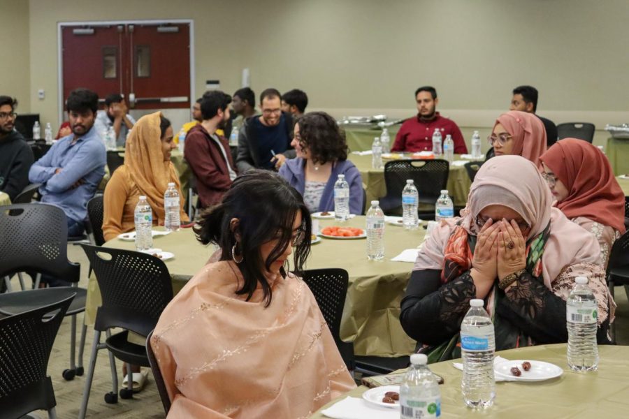 Ramadan Iftaar Banquet attendees pray before breaking their fast. The Muslim Students Association held the event on April 17 and invited any and all.