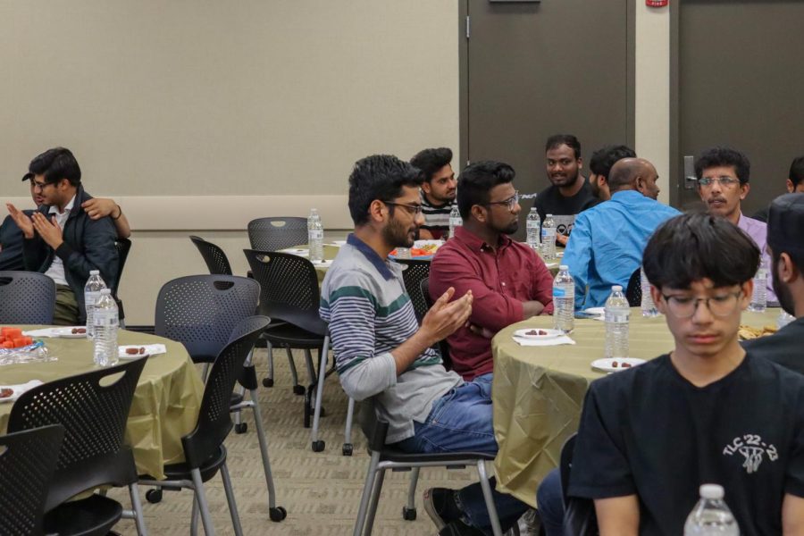 Ramadan Iftaar Banquet attendees pray before breaking their fast. The Muslim Students Association held the event on April 17 and invited any and all.