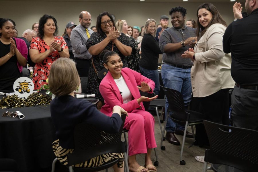 Oath of Office Ceremony attendees clap for Student Body President Iris Okere. Many congratulated Okere after Vice President of Student Affairs Teri Hall said that Okere is the first Black Afro-Latina student body president in student government history.