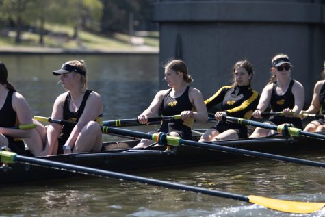 Taylor Spinelli rows with her teammates in the Plains Regional Regatta on April 23 at Boats and Bikes on River Vista.
