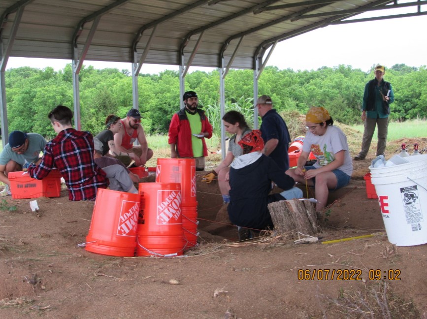 Donald Blakeslee and his crew on an archaeological site in Etzanoa. Etzanoa is an ancient city near Ark City, Kansas.