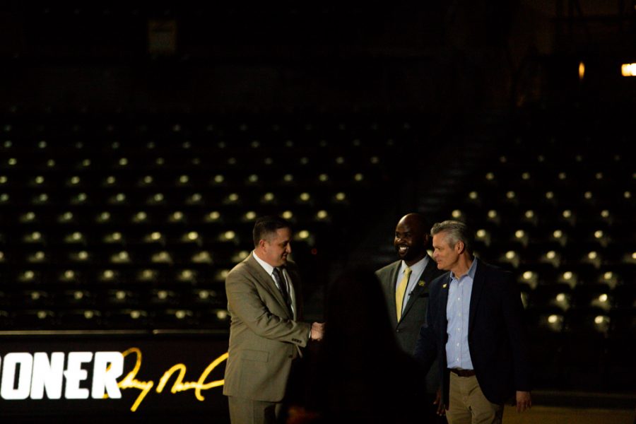 Athletic Director Kevin Saal and President of the univeristy Richard Numa walk in with new head womens basketball coach Terry Nooner at the press conference held on April 20 at Charles Koch Arena.