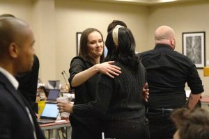 Senate Clerk Nora Malone goes in to hug At-Large Senator Mary Elizabeth Thornton, following their speeches to the Student Senate about experiencing sexual harassment. 