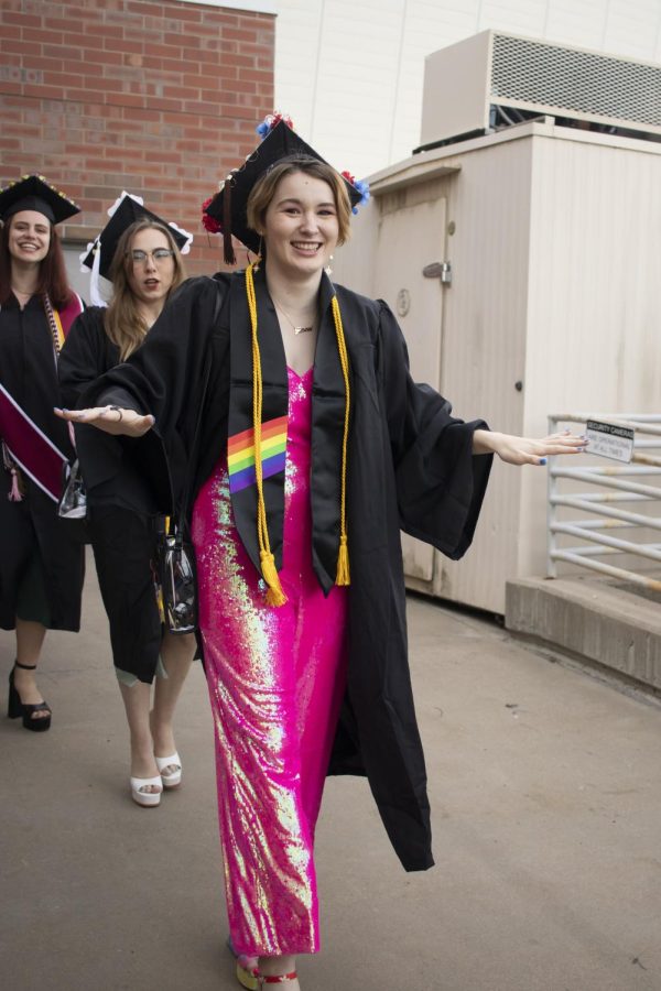 Graduates get ready to walk inside Charles Koch Arena for a 9 a.m. ceremony on May 13.