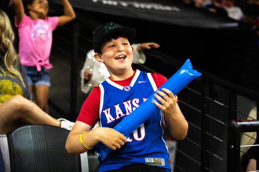 A child cheers for the SkyKings during their match against the Little Rock Lightning team on May 28. Families and children came out to meet celebrities after the game.