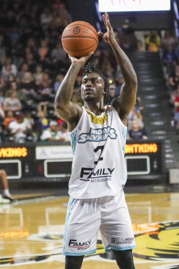 SkyKings point guard Julian Winton goes up for a two-pointer during the game against the Little Rock Lightning minor league team. The game was hosted inside Charles Koch Arena before the free FanFest.