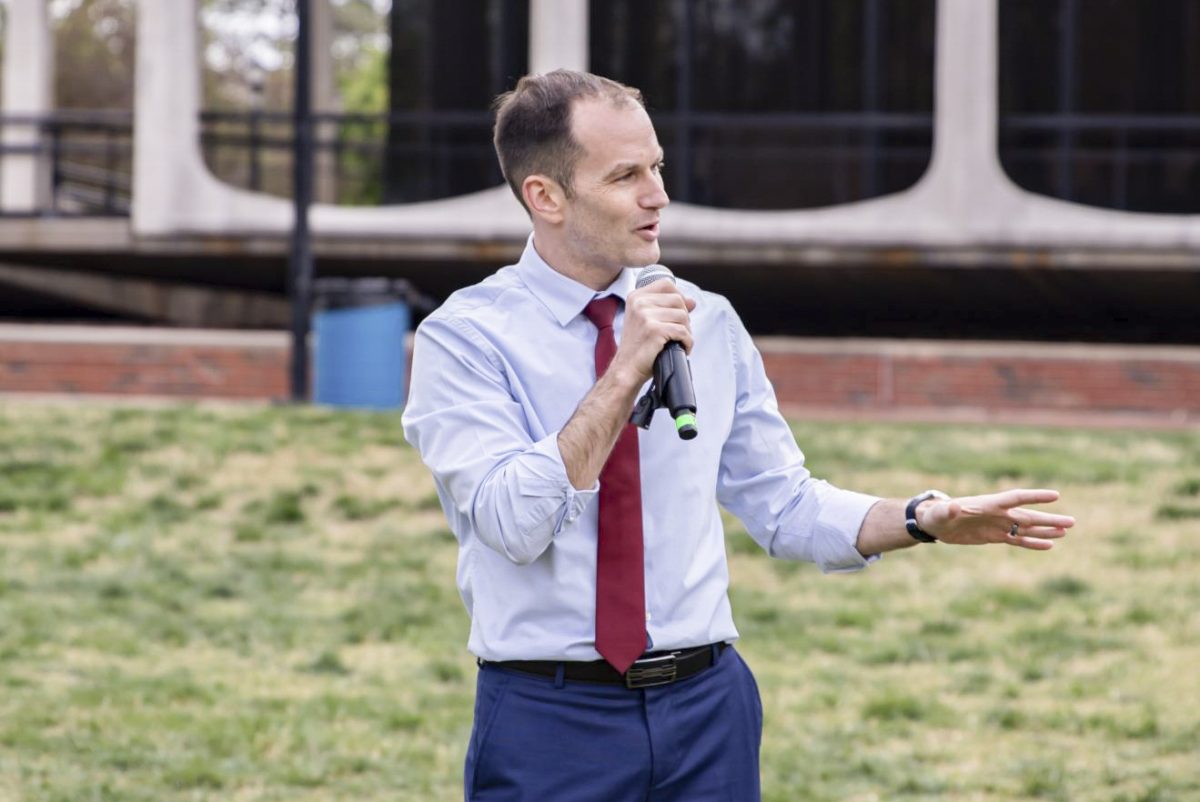 Wichita Mayor Brandon Whipple talks about implementing electric transit vehicles and electricity in Wichita during Earth Month, April 21, 2023. The event featured a variety of activities, from live music to food decorating.