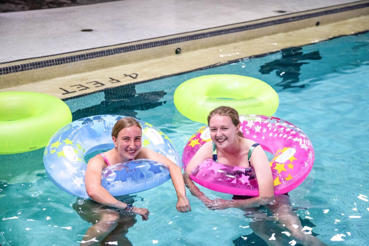 Sophomore Abby Otten and Olivia Oreilly poses for a photo at the Pool Party in the Heskett Center on Aug. 17. The event was held by Campus Recreation and Student Housing. 