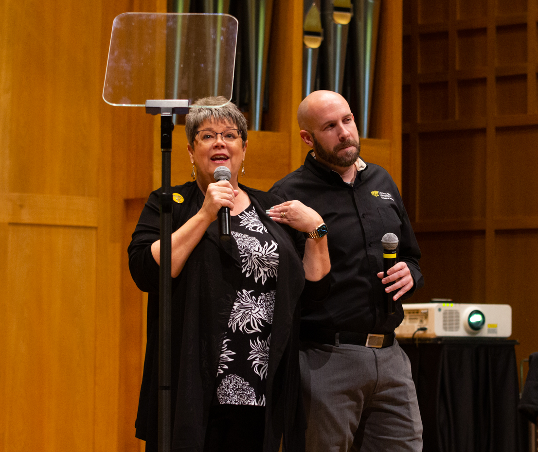Faculty Senate President Jolynn Dowling and Staff Senate President Jason Bosch joke about their senates beating the other in the Stock the Shocker Support Locker Challenge. Dowling and Bosch spoke at the 2023 Faculty and Staff Fall Address on Aug. 16.