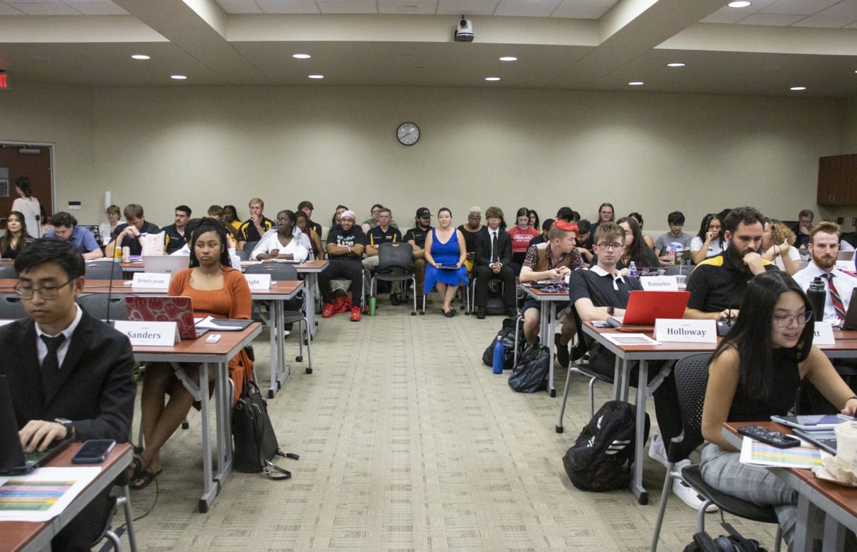 Senators and student organizations sit during the Student Senate meeting on Aug. 30.
