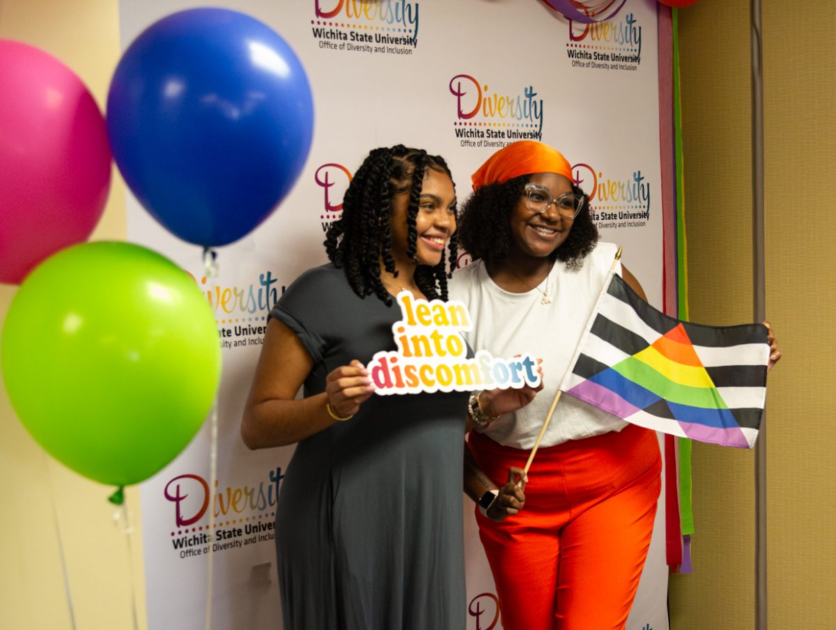 Iris Okere, Student Government president, poses with NaKayla Murff, ODI student activities coordinator, to celebrate the Office of Diversity and Inclusions open house on Aug. 30.