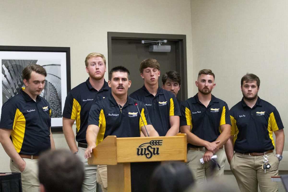 The+Shocker+Racing+Formula+SAE+team+speaks+to+the+Student+Senate+on+Aug.+23+in+hopes+of+recieving+additional+funding+for+their+team.+The+team+built+cars+for+competitions.