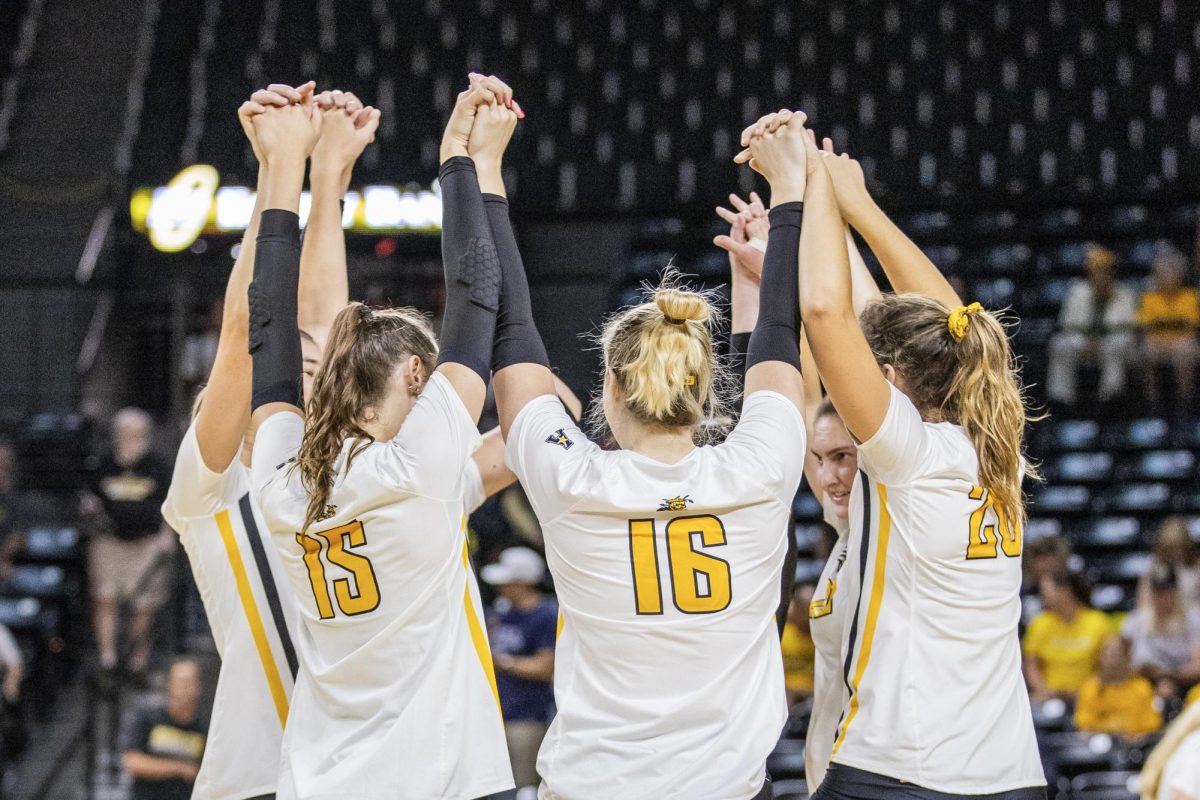 The+WSU+volleyball+starting+players+huddle+together+before+the+start+of+the+first+set+against+Colorado+on+Sept.+9.+This+matchup+was+Colorados+first+time+facing+Wichita+State.
