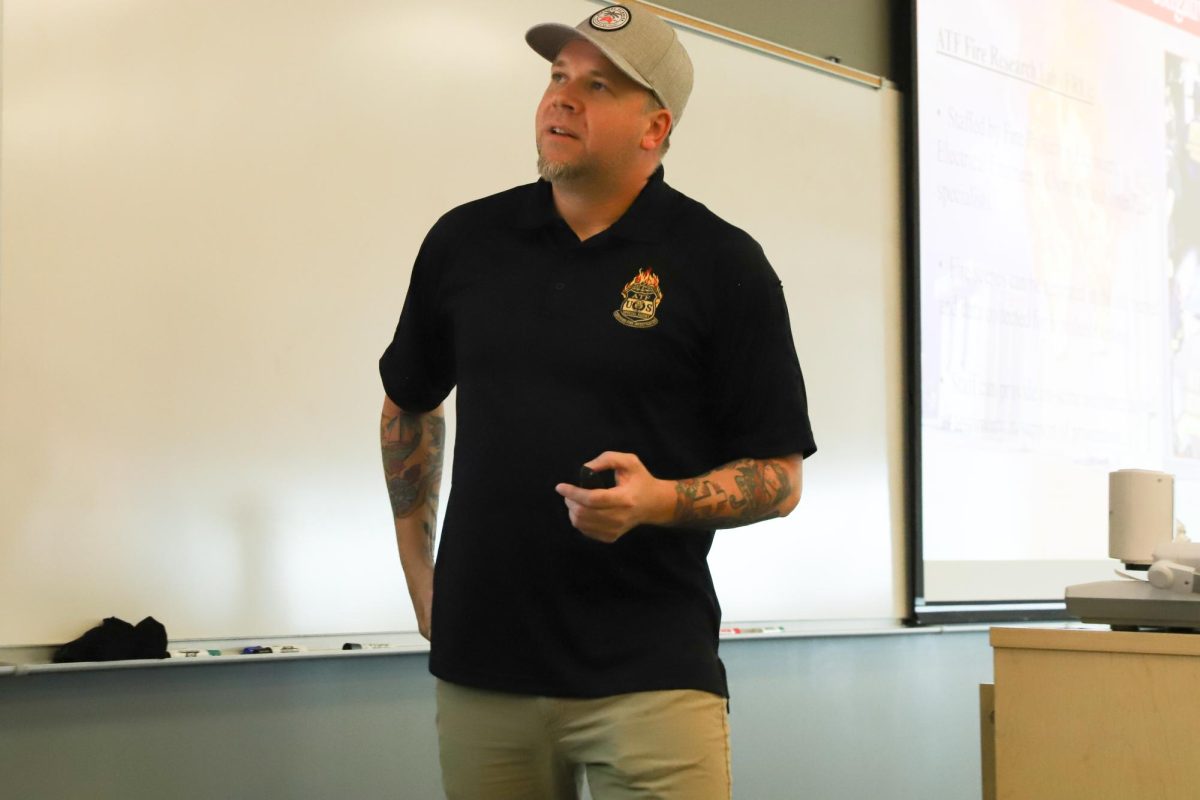 Aaron Chaffee speaks at a Forensic Science Week event.