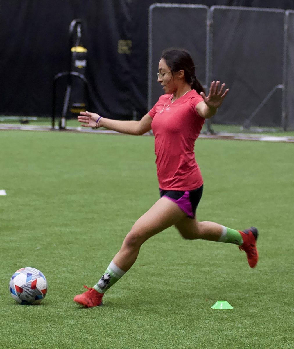 Jessica Martinez plays forward, handling the ball during the WSUs women’s soccer club practice on Sept. 12.