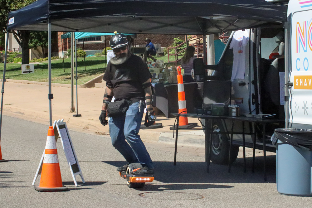 Local shows skateboarding talent at ICT Open Streets, where roads were blocked off so that attendees could travel via bike, skateboard or on foot. 