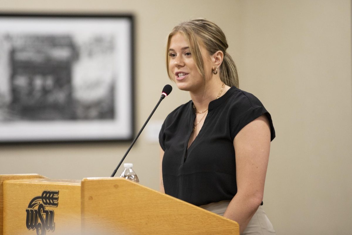 Speaker of the Senate Kylee Howard speaks to various people at Wichita State at the State of the Student Body on Sept. 6.