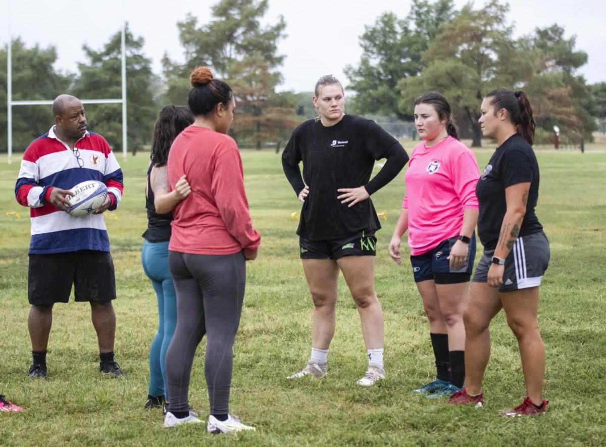 The Wichita Valkyries players rest for a moment while deciding what drill to run next on Sept. 11. President Jenna DeRoo and Captain Gillian Stuart plan each practice schedule based on the needs of the team.