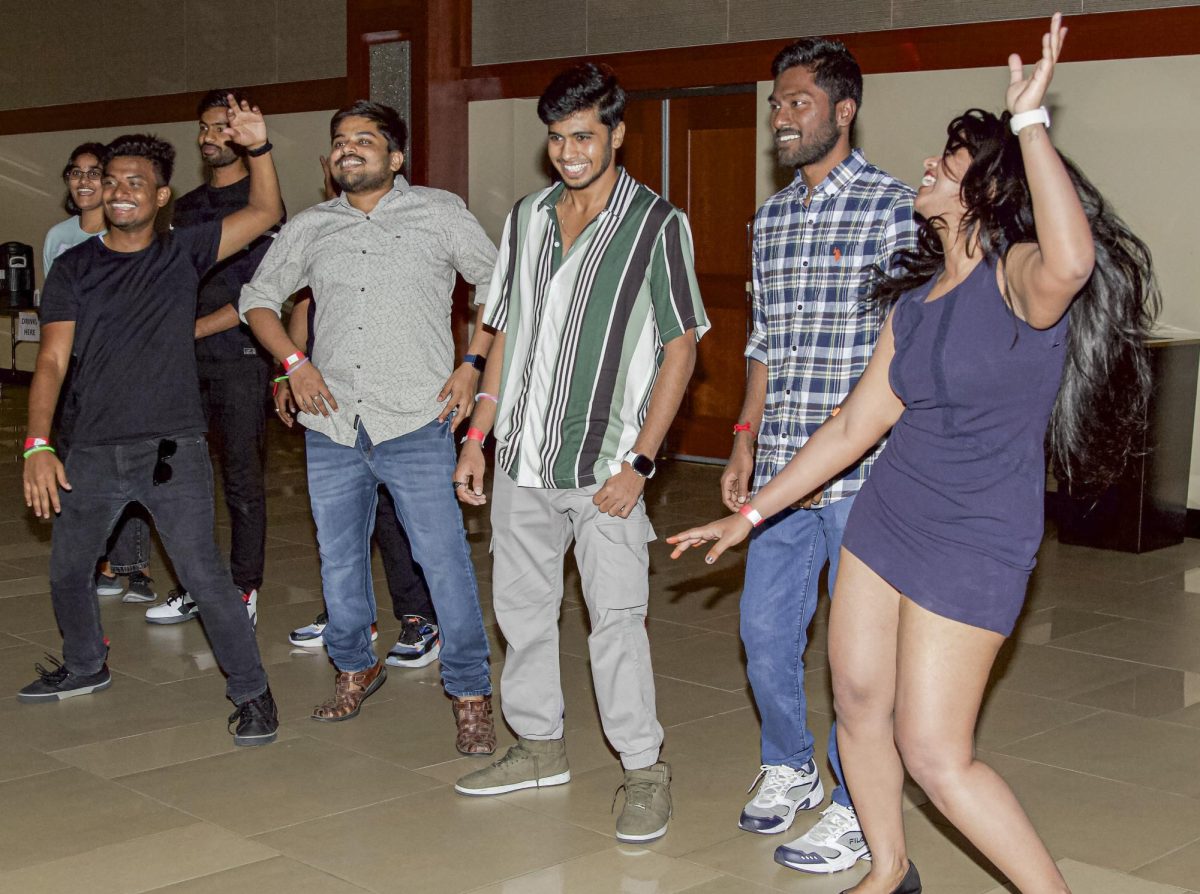 A group of students dance together at the Bollywood Night event on Sept. 2.