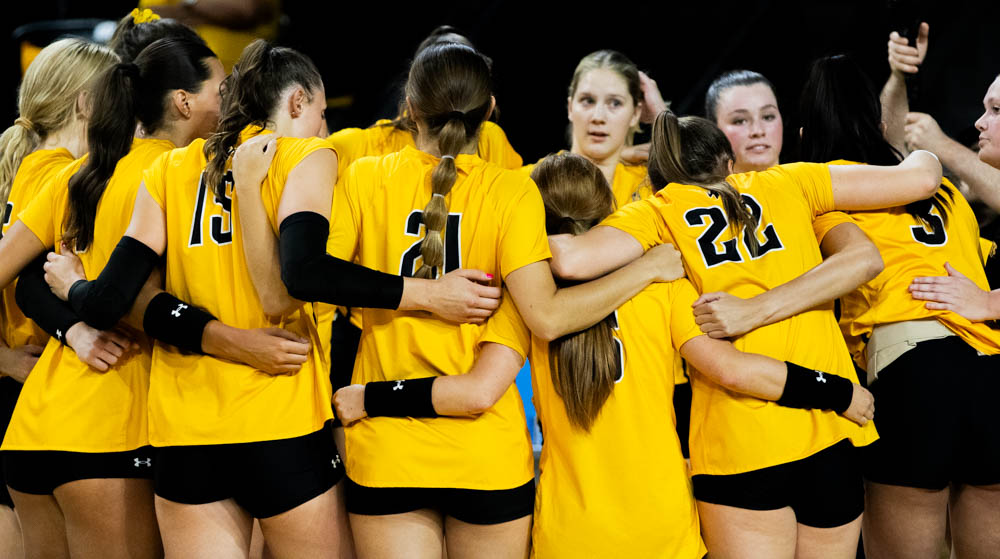 The Shockers huddle before the match against the Kansas Jayhawks on Sept. 7 at Charles Koch Arena. The Shockers came up short in the fourth set and lost the match with a score of 3-1.