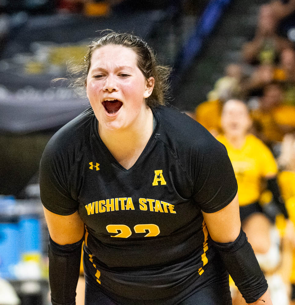 Defensive specialist and libero Gabi Maas shouts with joy during the game on Sept. 7 at Charles Koch Arena. Gabi Maas had seven assists and 18 digs against the Jayhawks on Yellow Out night.