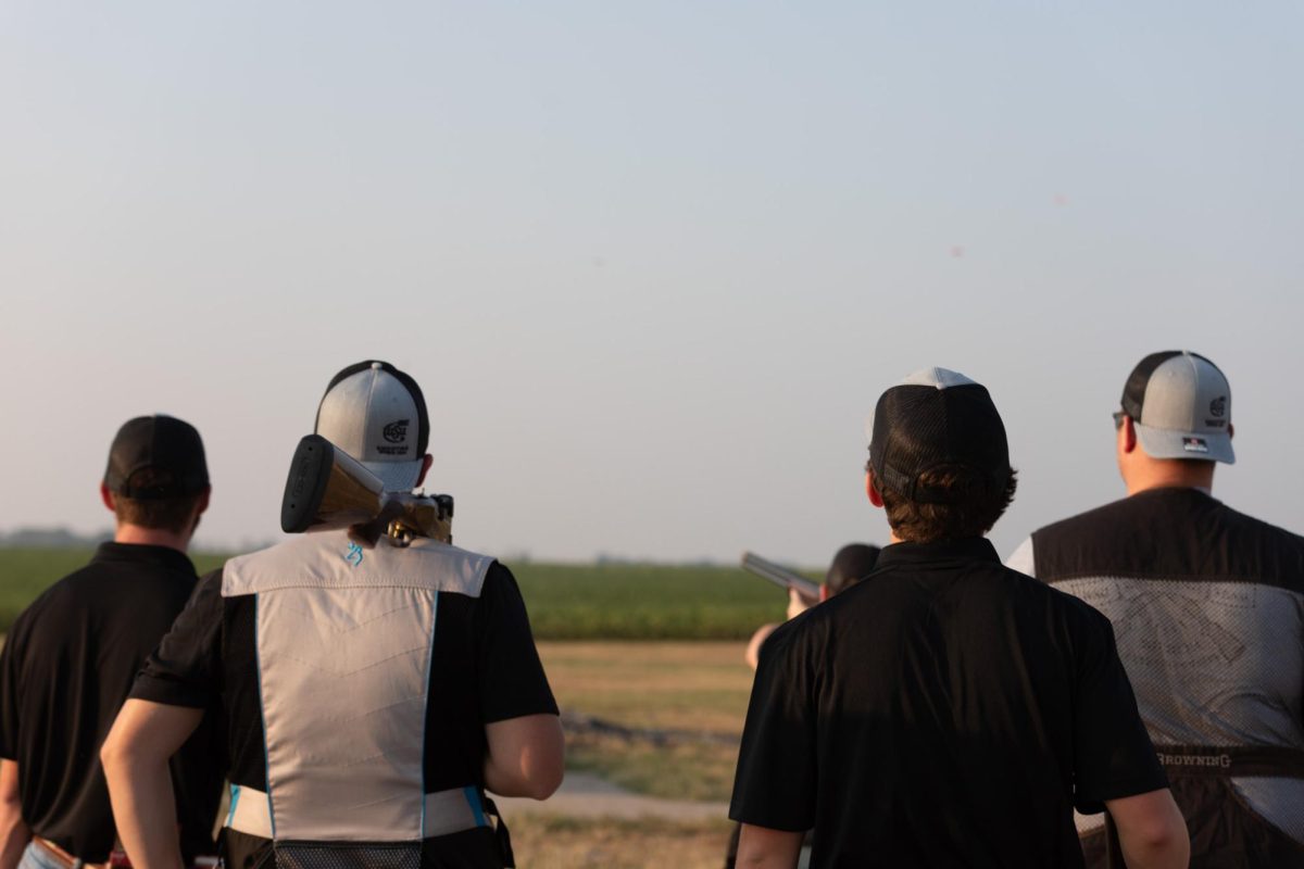 Shooting Team members watch each other practice on Sept. 6.