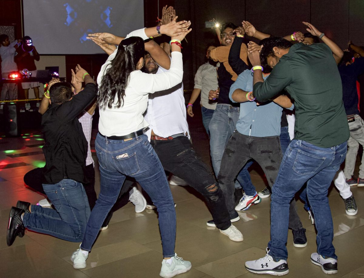 A group of students dance together at the Bollywood Night event on Sept. 2.