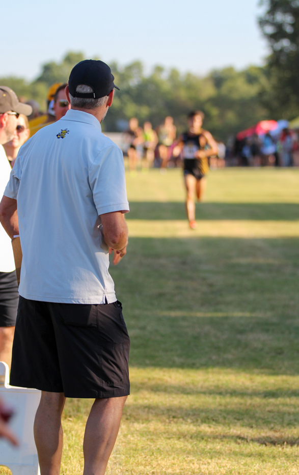Director of Operations cheers on the Mens Cross Country team for Wichita State at the JK Gold Classic on Sept. 2.