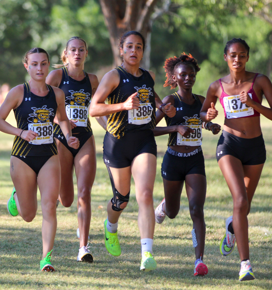 The lead pack of the girls cross country meet were Miranda Dick, Peyton Pogge, Lubda Aldulaimi, Lucy Ndungu, and unattached Abeba Sullivan. Ndungu placed first with a time of 17:42.5 in the 5k.