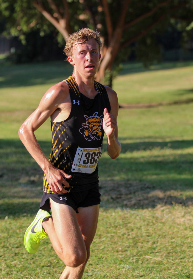 Wichita State runner Trey Rios runs at the JK Gold Classic on the new course. Rios finished in third place with a time of 18:21.0 in the 6k.