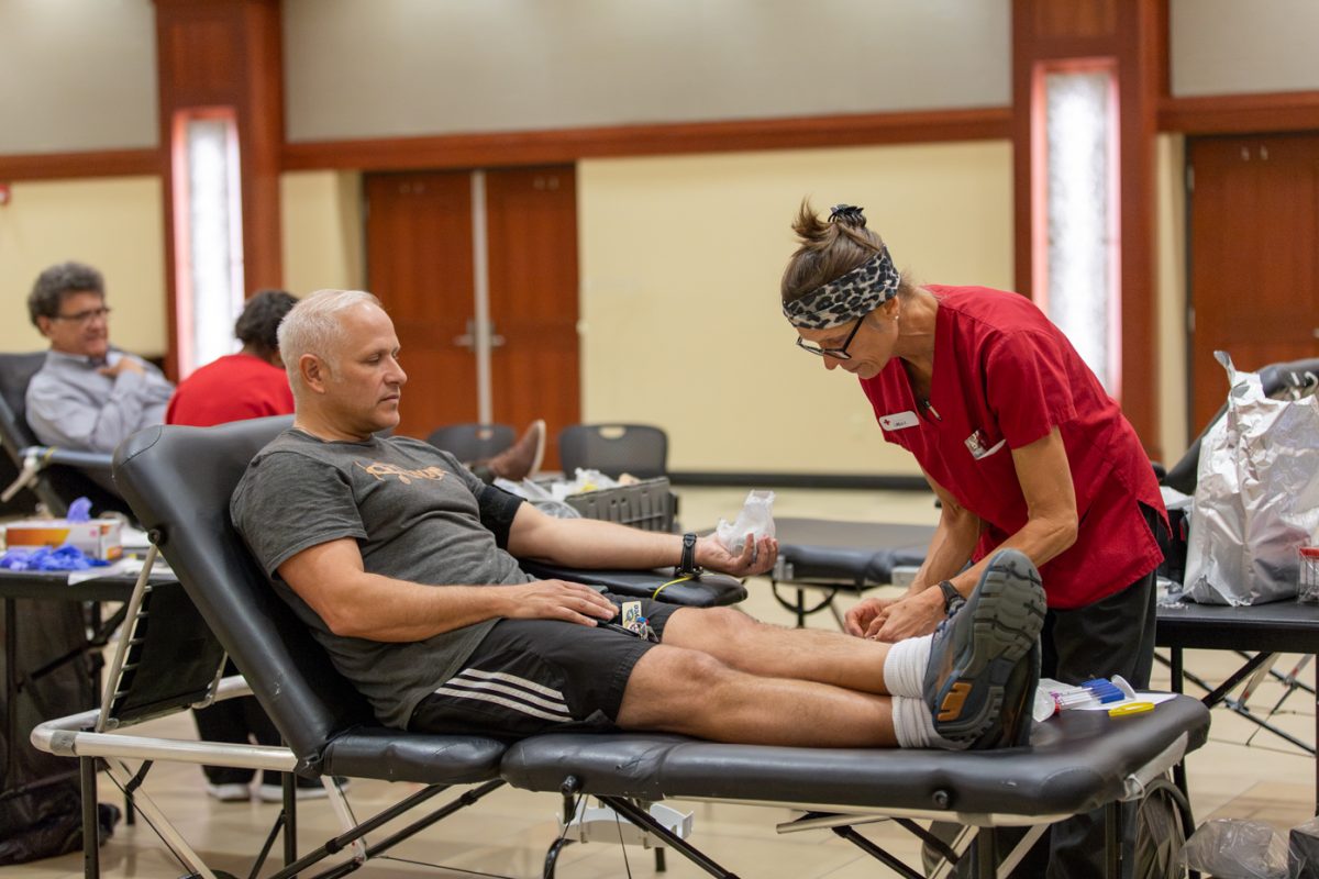 Ryan Hughes, a member of the community, sits as he is prepped for the blood draw. The Blood Drive event was hosted in the Ballroom of the RSC on Sept. 5 and 6.