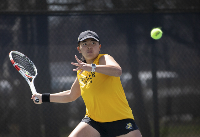 Redshirt senior Natsumi Kurahashi hits the ball toward Houston on April 1, 2022. Kurahashi has been on the womens tennis team for four years and is heading into her fifth year. (cropped)