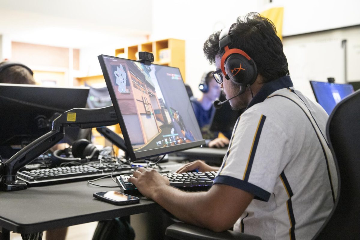 Vamshi Voopkur, a new recruit on the JV Valorant team, warms up for an esports match on Sept. 12.