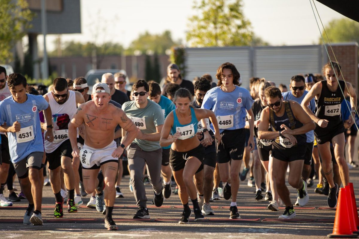 Runners begin the third annual Suspenders4Hope 5K behind the Steve Clark YMCA at Wichita State. The Sept. 30 event was meant to honor the lives of individuals lost to suicide as well as to support conversations about mental health.