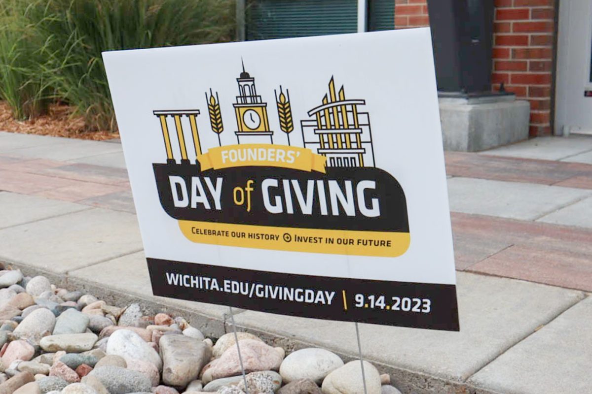 Founders Day of Giving sign located in front of The Suites. Founders Day is an opportunity for donors to donate money to Wichita State and show support for various organizations.