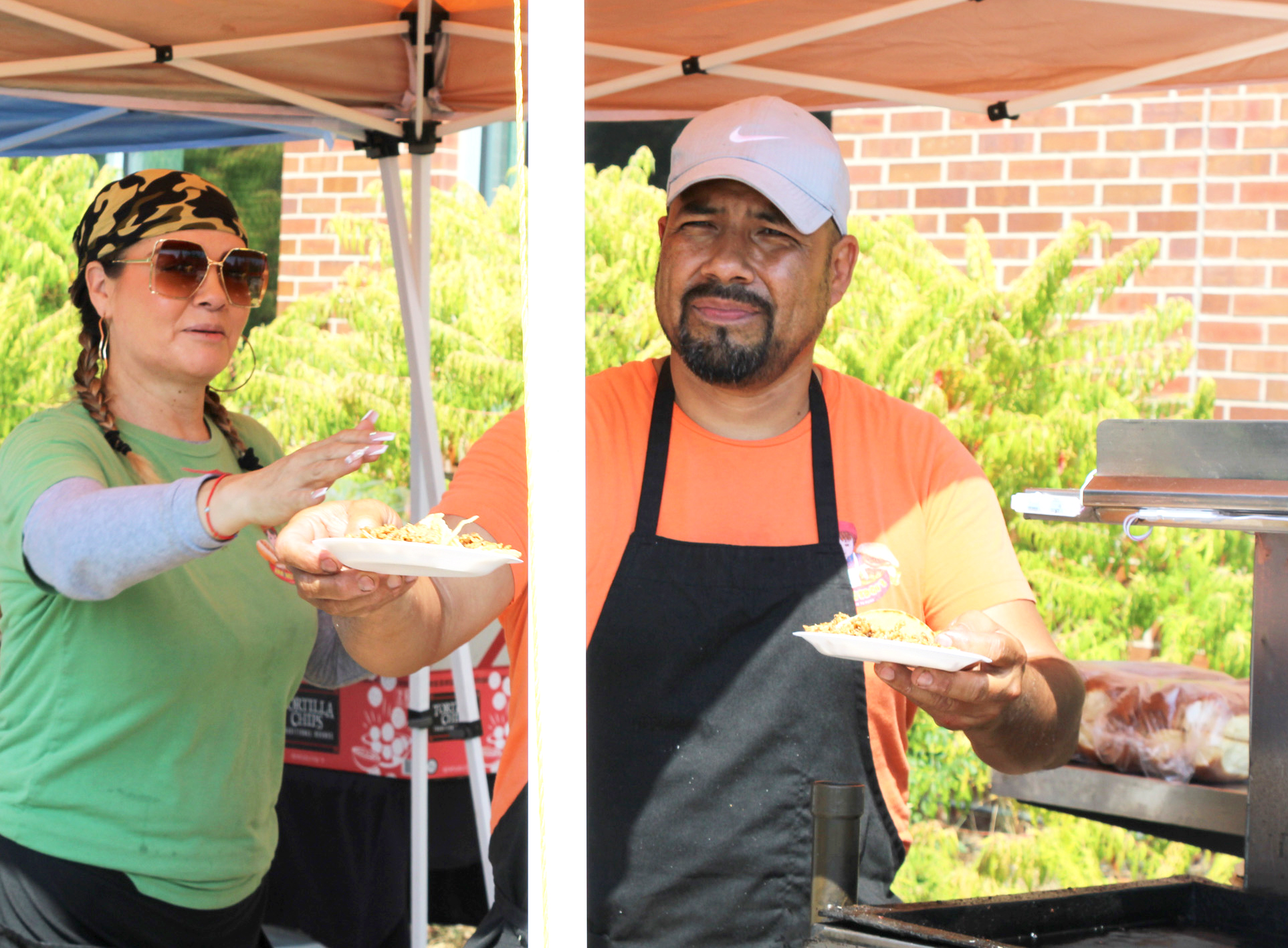 Julio Mireles and Carmencita Mireles help serve food at the Food Truck Friday event on Sept. 8. Latino Hot Dogs, also known as Elatino Dogos Y Hamburguesas, is ran by Julio and his partner Carmencita. 