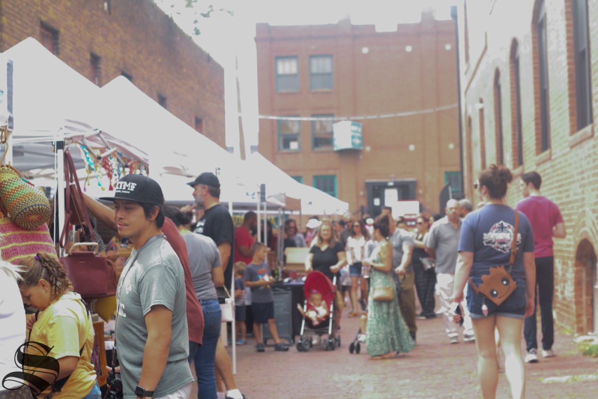 The alleys around the brickyard were lined with booths selling crafts and food for garlic fest.