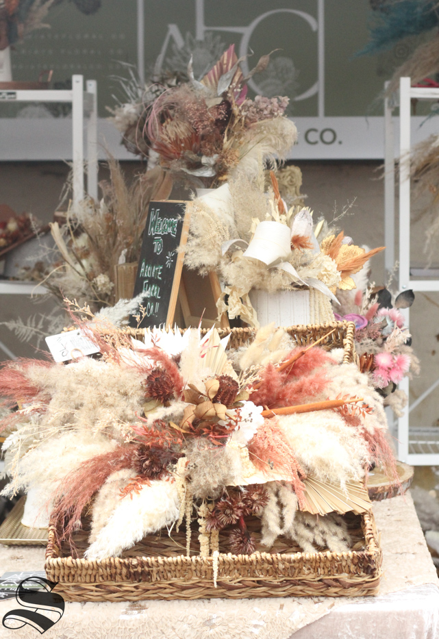 Sam Levin,  owner of Arriate Floral Co. makes custom dried floral arrangements for events.
