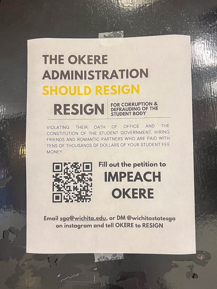 Photo of the Okere Administration Should Resign flyer in Hubbard Hall on Sept. 6.
