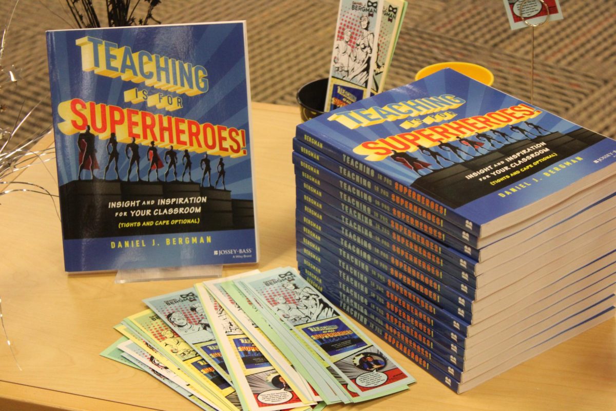 A display of Professor Daniel Bergmans book, Teaching is for Superheroes, is available to guests at the Night with the Author Event on Sept. 14. Bergman signed copies that night.