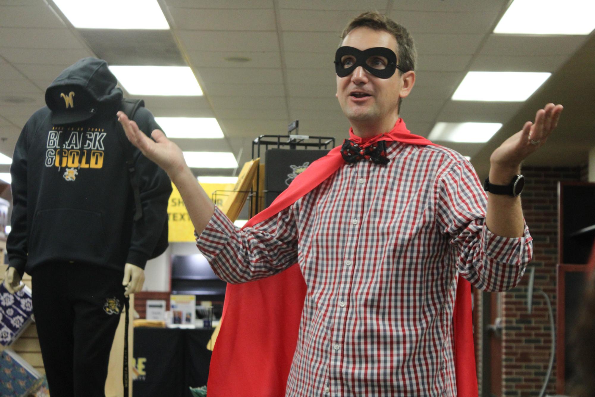 Professor Daniel Bergman discusses his book, Teaching is for Superheroes, with the audience at the Night with the Author event on Sept. 14. Bergman connected his passion for teaching with superheroes.