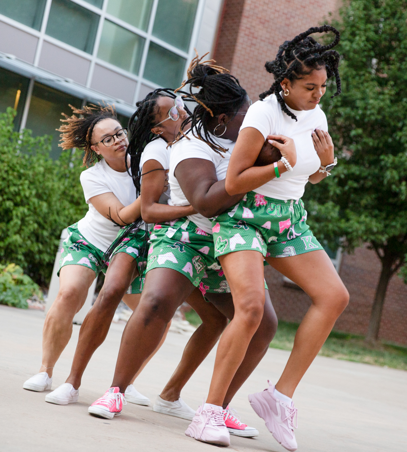 Mackenzie Boyd, JaNae McKelvy, Dacaria Harris, and Iris Okere stroll together for Alpha Kappa Alpha Sorority. This event was hosted by the National Pan-Hellenic Council on Aug. 31.