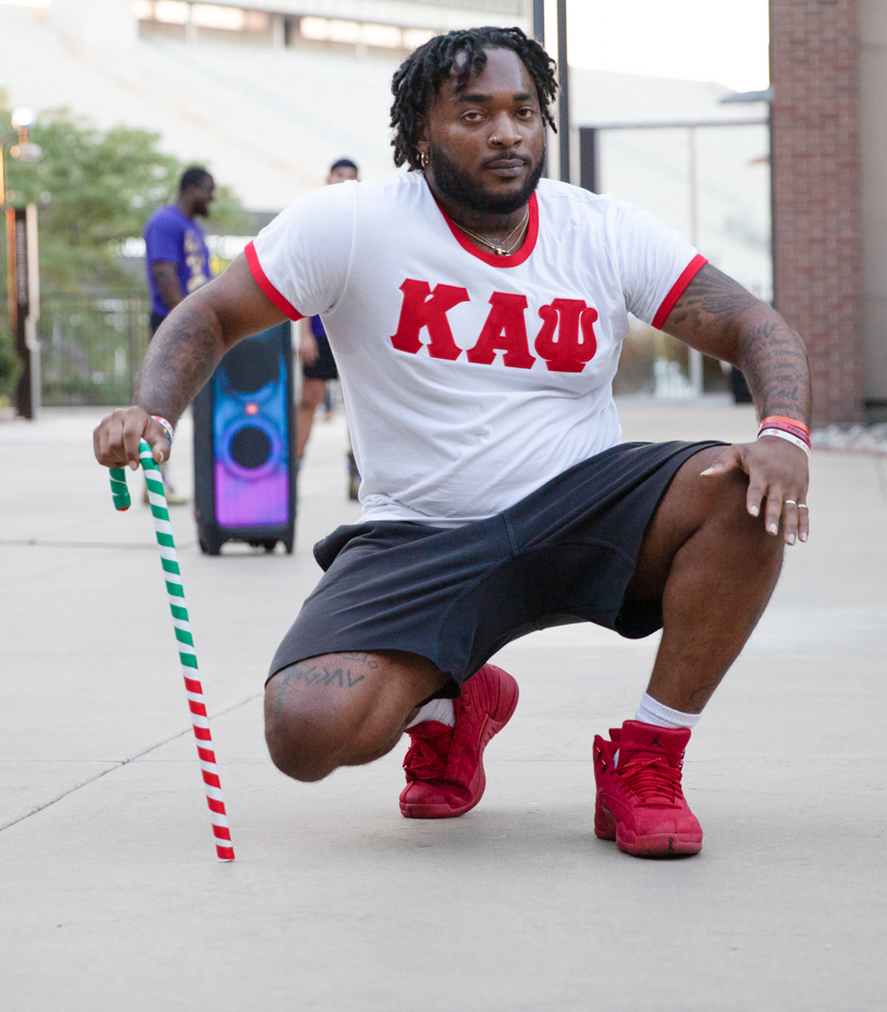 Joseph Arps does his National Pan-Hellenic Council Yard Show step with the Delta Upsilon Nupes chapter of Kappa Alpha Psi on Aug. 31.