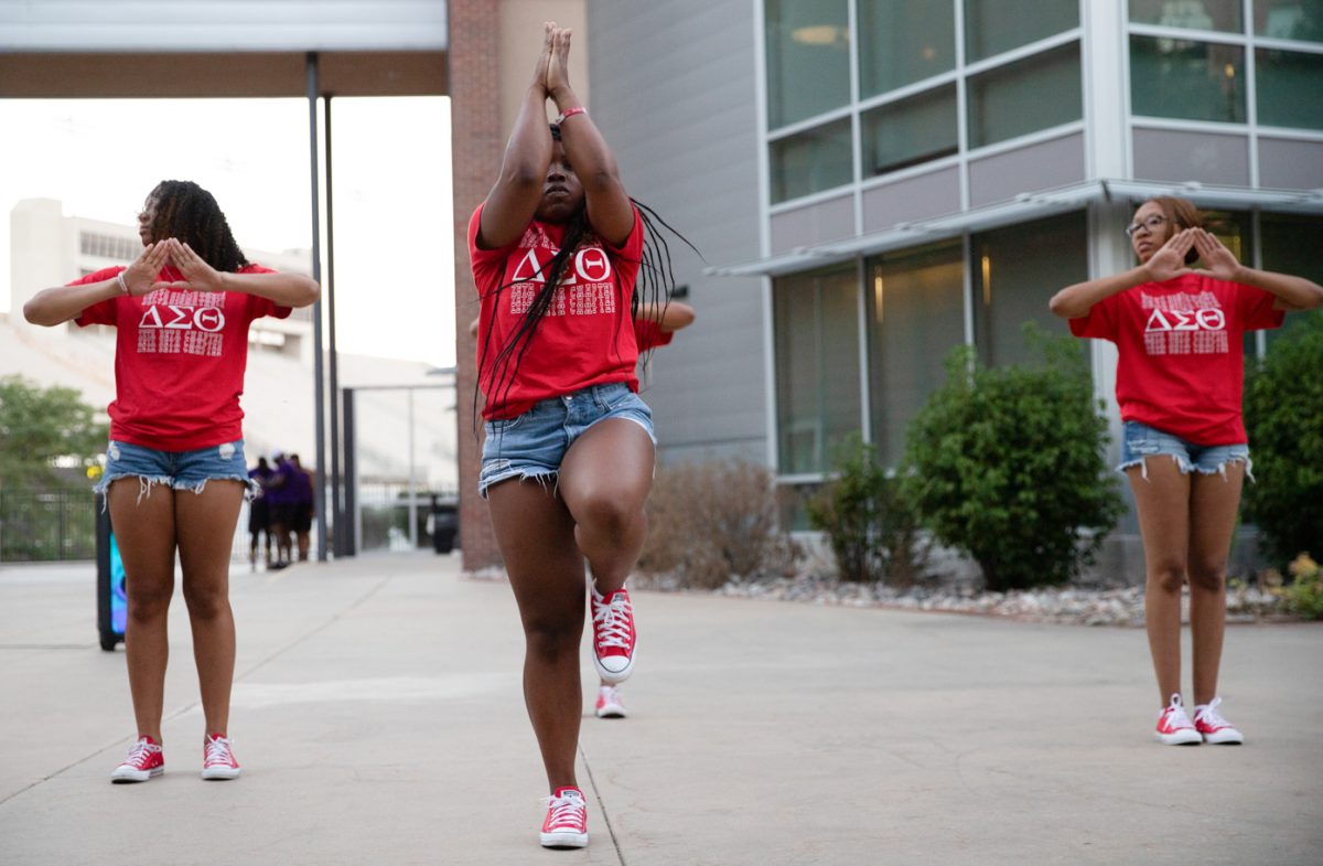 Aubany Russell, Jakia Logan, and Ashlynn Clark stroll at the National Pan-Hellenic Council Yard Show on Aug. 31. The members were all part of Delta Sigma Theta.