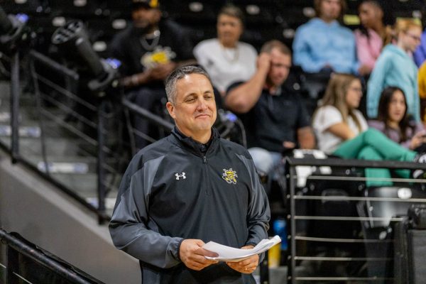 Director of Athletics Kevin Saal smirks after the completion of the basketball scrimmages at Shocker Madness on Oct. 7.