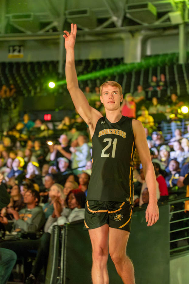 Henry Thengvall enters the arena during the team presentation on Oct. 7 at Shocker Madness.